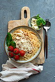 Spaghetti with cheese, tomatoes and basil