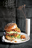 Veggie burger with avocado and rocket salad