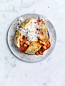 Baked potatoes with baked barbecue beans