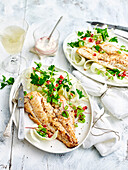 Fish with fennel and pomegranate salad