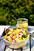 Radish and cucumber salad with mango