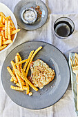 Schnitzel au gratin with french fries