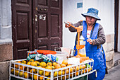 Orange juice vendor, Plaza 25 de Mayo (25 May Square), Sucre, Bolivia