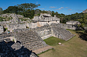 The partially restored ruins of the twin temples on top of Structure 17 in the ruins of the pre-Hispanic Mayan city of Ek Balam in Yucatan, Mexico.