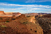 Sunset light on the formations of Capitol Reef National Park, viewed from Sunset Point on the edge of Sulpur Creek Canyon.