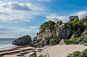 El Castillo or the Castle is the largest temple in the ruins of the Mayan city of Tulum on the coast of the Caribbean Sea. Tulum National Park, Quintana Roo, Mexico.