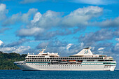 Paul Gauguin cruise anchored in front of Bora Bora Vaitape dock, Society Islands, French Polynesia, South Pacific.