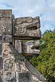 The Platform of the Eagles and Jaguars, built in Maya-Toltec style, in the ruins of the great Mayan city of Chichen Itza, Yucatan, Mexico. The Pre-Hispanic City of Chichen-Itza is a UNESCO World Heritage Site.