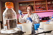 Woman scientist doing experiments at a plant science lab in College Park, Maryland, USA