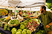Fresh produce at the Hey Bayles! Farm stall during the Saturday Farmer's Market in Eugene, Oregon.