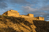 Morning light on the stairs and platform of Building H at the pre-Columbian Zapotec ruins of Monte Alban in Oaxaca, Mexico. A UNESCO World Heritage Site.
