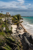 El Castillo or the Castle is the largest temple in the ruins of the Mayan city of Tulum on the coast of the Caribbean Sea. Tulum National Park, Quintana Roo, Mexico.