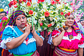 Salvadorian people participate in the procession of the Flower & Palm Festival in Panchimalco, El Salvador