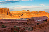 Sunset light on the formations of Capitol Reef National Park, viewed from Sunset Point on the edge of Sulpur Creek Canyon.