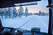 Bus transport on icy roads in Finnish Lapland, Finland