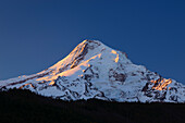 Mount Hood at sunrise from Lawrence Lake, Mount Hood National Forest, Oregon.