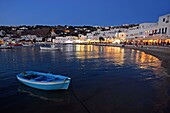 Fishing boats at night in Mykonos town, Greece