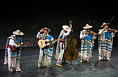 Musicians in costume performing traditional music at Xcaret Mexico Espectacular dinner show at Xcaret eco theme park, Riviera Maya, Mexico.