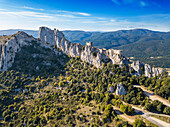 Aerial View of the Cathar castle of Peyrepertuse in Languedoc-Roussillon, France, Europe. Ancient Cathar site of the Château de Peyrepertuse, Peyrepertuse Castle in Corbieres Occitanie Midi Pyrenees France.
