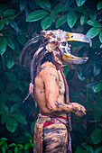 Native American with traditional costume participates at the festival of Valle del Maiz in San Miguel de Allende ,Mexico.