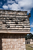 Stone carvings of birds in the Quadrangle of the Birds in the ruins of the Mayan city of Uxmal in Yucatan, Mexico. Pre-Hispanic Town of Uxmal - a UNESCO World Heritage Center.
