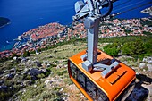 Dubrovnik Cable Car, a 4-minute ride transports visitors 778 meters to a plateau offering Old City views & a restaurant.