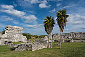 The House of the Columns in the ruins of the Mayan city of Tulum on the coast of the Caribbean Sea. Tulum National Park, Quintana Roo, Mexico. At left is the Temple of the Frescos.