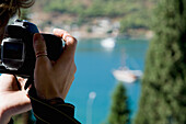 Person Taking Pictures Of Boats In Harbour
