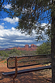View Across Red Rock State Park With A Metal Bench In The Foreground.