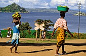 Mother And Daughter Carrying Fruit To Market Near Lake Victoria