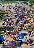 Holiday Makers On St Just Beach