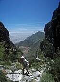 Woman Walking Up Platteklip Gorge To Top Of Table Mountain