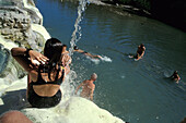 People Relaxing In Thermal Sulphurous Spa, Fosso Biano (Bagni San Filippo)