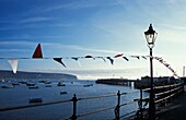 Streamers Blowing On Victorian Pier At Swanage