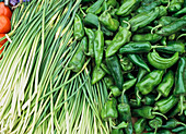 Garlic Shoots And Green Peppers For Sale At The Kashgar Sunday Market,Xinjiang,China.