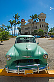 Vintage Car Near Palacio De Valle On Punta Gorda, Cienfuegos,Cuba