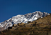 Village In Atlas Mountains With Snowcapped In Background, Atlas Mountain,Morocco