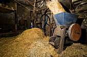 Straw Surrounding Apple Shredding Machine In Barn, Brimblecombes Devon Farmhouse Cider Press,Farrants Farm,Dartmoor National Park,Dunsford,Devon,Uk