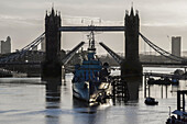 London Bridge And Hms Belfast In River Thames; London, England