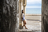 Portrait Of A Chinese Young Woman In Maricel Palace;  Sitges, Barcelona Province, Spain