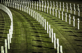 Rows of white crosses on grass, Cambridge American Cemetery and Memorial; Cambridge, Cambridgeshire, England