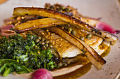 Plate of halibut with parsnips and kale, Hotel Husafell; Iceland