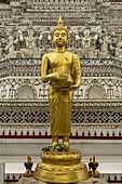 Golden Buddha statue at Temple of Dawn; Bangkok, Thailand