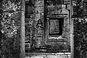 Monochrome bas-relief of crowned woman beside window, Banteay Kdei, Angkor Wat; Siem Reap, Siem Reap Province, Cambodia