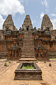 Steep stone steps climb to stone towers, Pre Rup, Angkor Wat; Siem Reap, Siem Reap Province, Cambodia