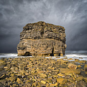 Marsden Rock, a 100 feet (30 metre) sea stack off the North East coast of England, situated at Marsden, South Shields; South Shields, Tyne and Wear, England