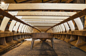 Construction of a gondola, the wooden frame in a workshop; Venice, Italy