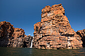 Craggy sandstone cliffs in the Springtime at the King George River waterfalls in the Kimberley Region; Western Australia, Australia