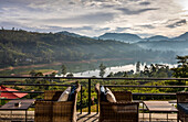 View over Castlereagh Reservoir from the terrace at Camellia Hills, Teardrop Boutique, tea estate bungalow hotel in Hill Country; Castlereagh Valley, Nuwara Eliya District, Central Province, Sri Lanka