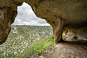 View from rock cave along the trails through the Gravina di Matera River and Park near Matera; Matera, Basilicata, Italy